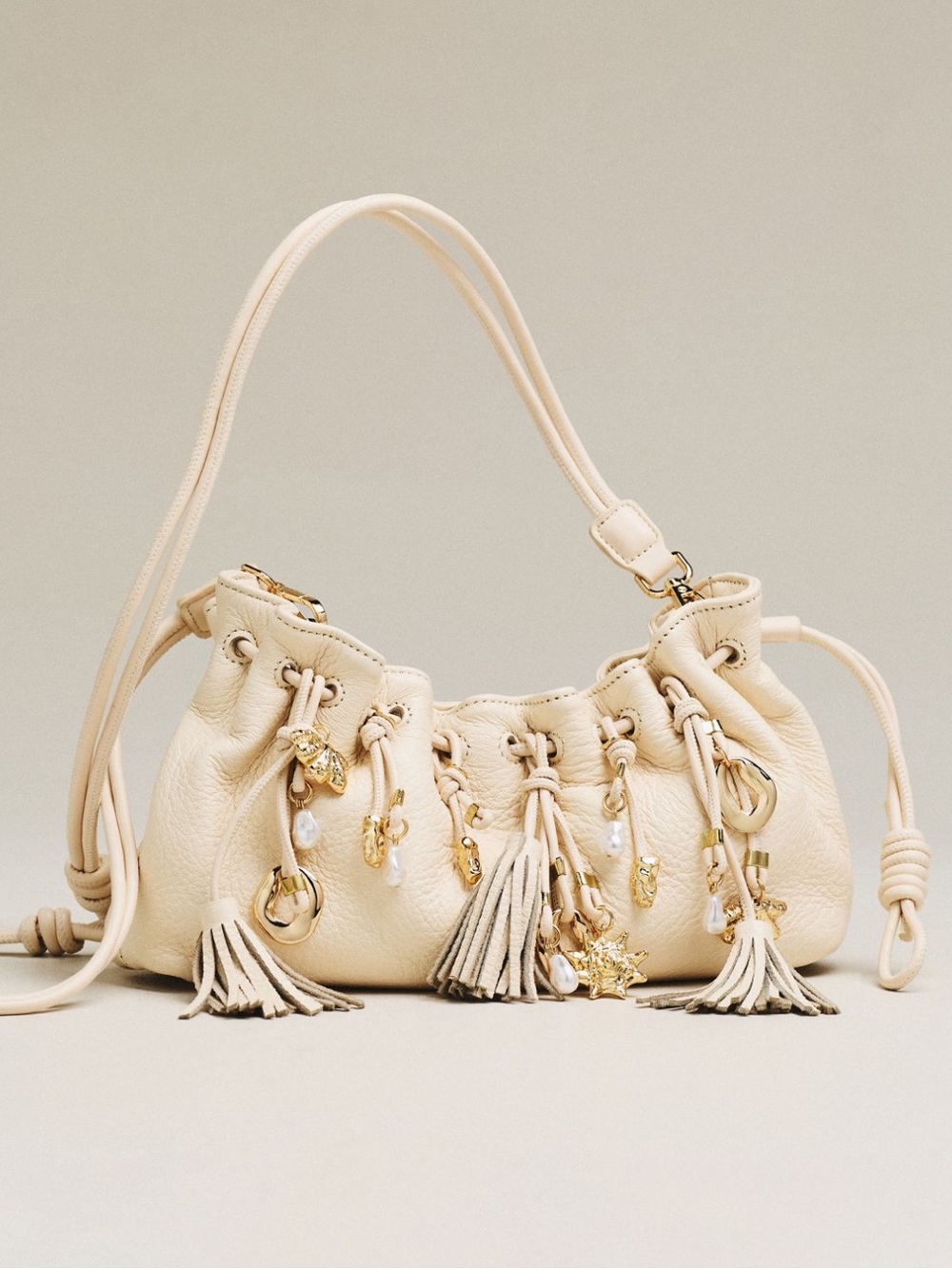 Cream Tassel Drawstring Shoulder Bag